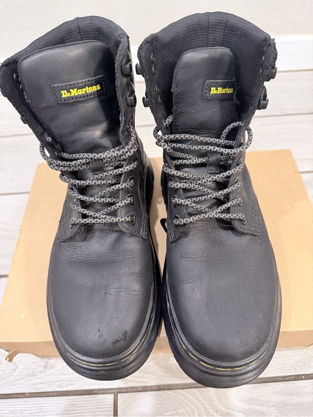 Dr. Martens Black Leather Lace-Up Work Boots with Yellow Logo
